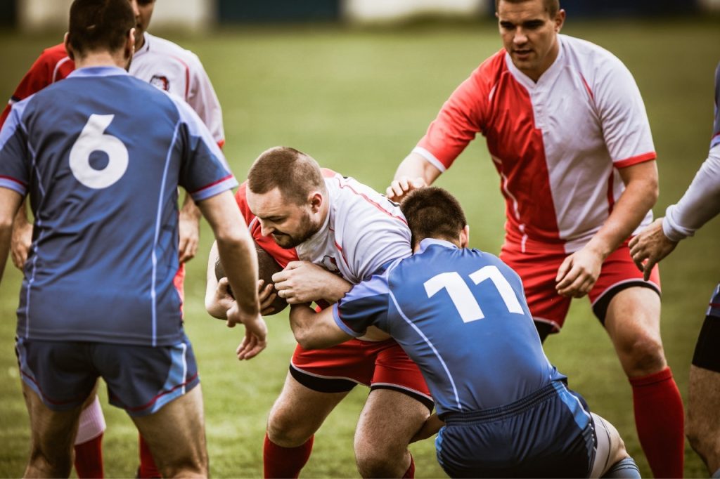 Men playing rugby at taunton rugby club