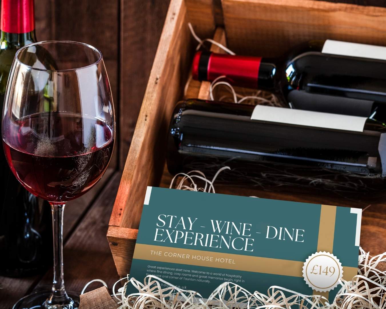http://Voucher%20in%20front%20of%20wine%20bottles%20for%20the%20Corner%20House%20Hotel