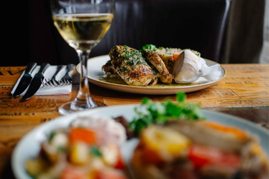 Chicken dish with coucous and lemon.