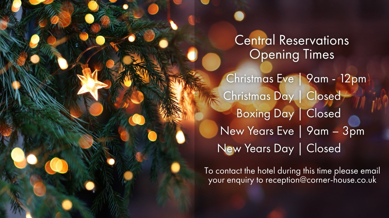 Christmas tree with text displaying opening times for the festive period.